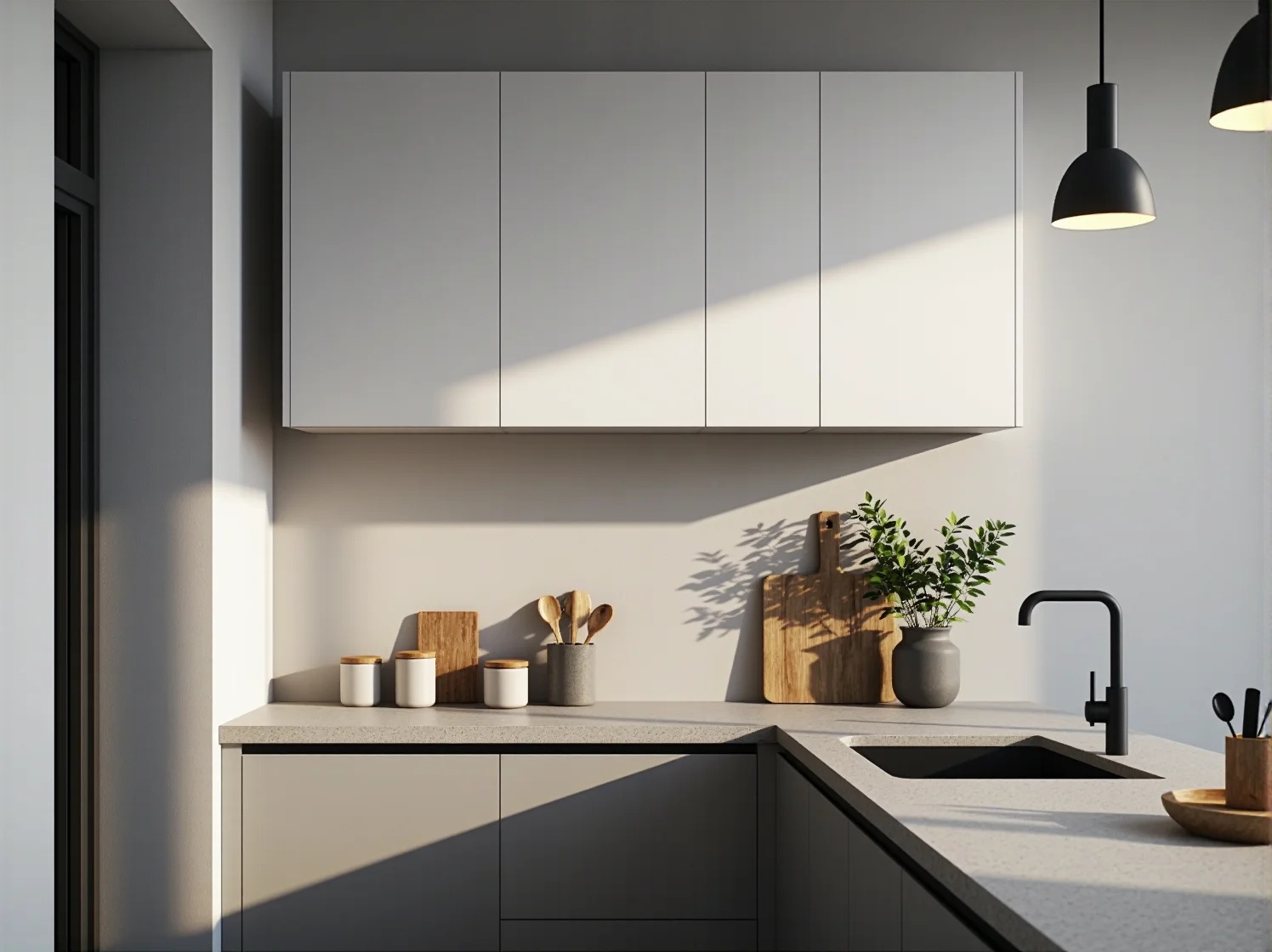 Nowoczesne oświetlenie kuchni z czarnymi minimalistycznymi lampami wiszącymi.